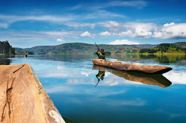 Lake Bunyonyi viewing from a boat, Wondering where to go after gorilla trekking? Discover the best destinations to visit in Uganda and Rwanda after your unforgettable gorilla trekking adventure.
