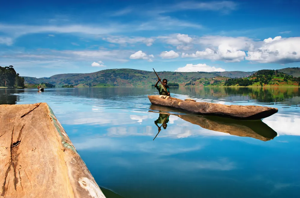 Lake Bunyonyi viewing from a boat, Wondering where to go after gorilla trekking? Discover the best destinations to visit in Uganda and Rwanda after your unforgettable gorilla trekking adventure.